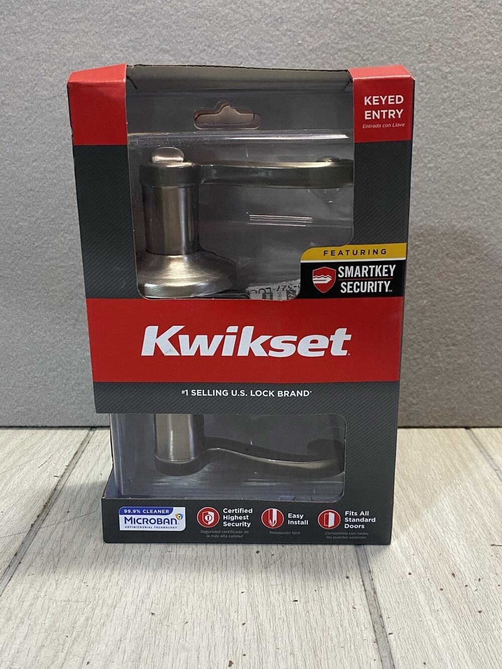 Kwikset Tustin Satin Nickel Entry Door Handle Featuring SmartKey Security